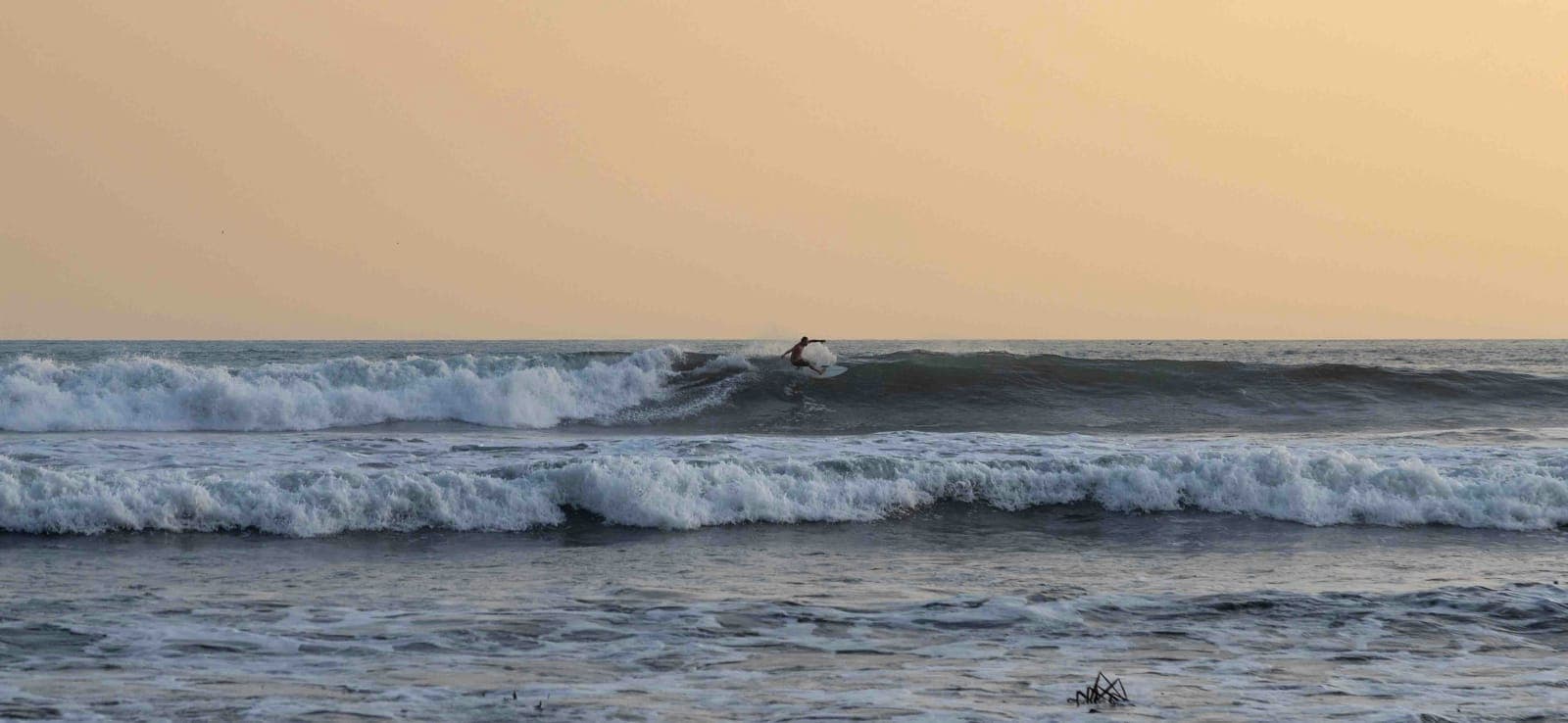 Surfer near Jacó and Playa Hermosa on Costa Rica's Central Pacific coast, host region of the WSL Garabito Surf City PRO 2026